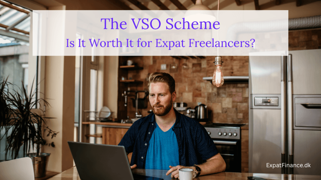 Man working on a laptop in a kitchen under overlay text reading: "The VSO Scheme: Is It Worth It for Expat Freelancers?" by ExpatFinance.dk